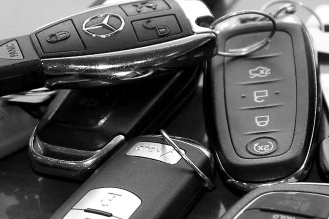 Assorted car keys and remote key fobs