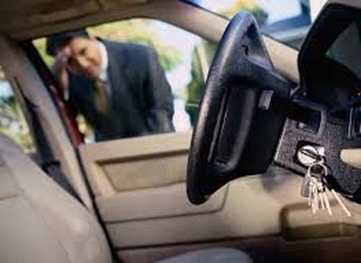Locksmith opening a locked car door in Augusta, GA