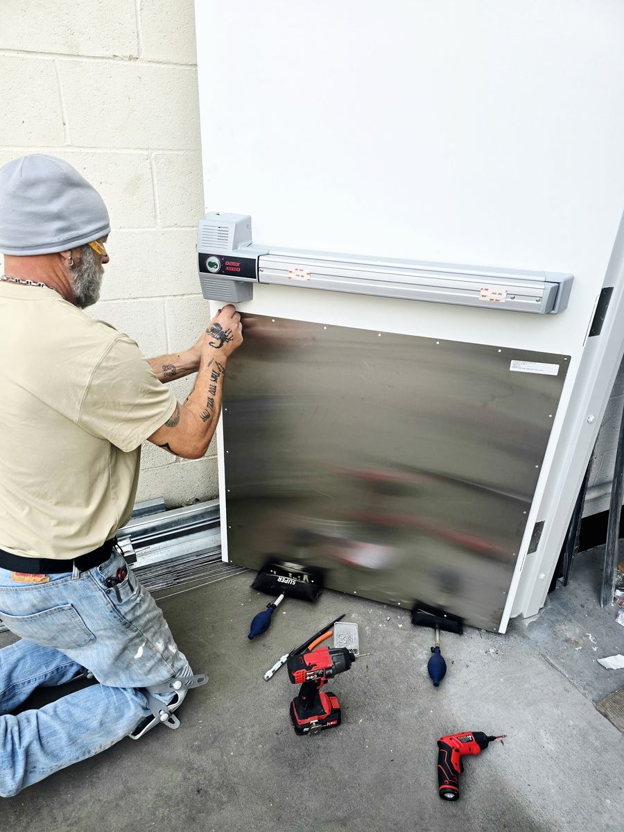 Installing a push bar exit device on a steel door