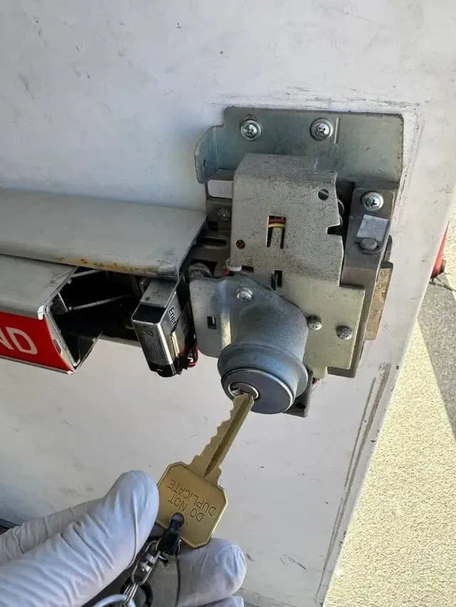 Key inserted in a lock cylinder during rekeying